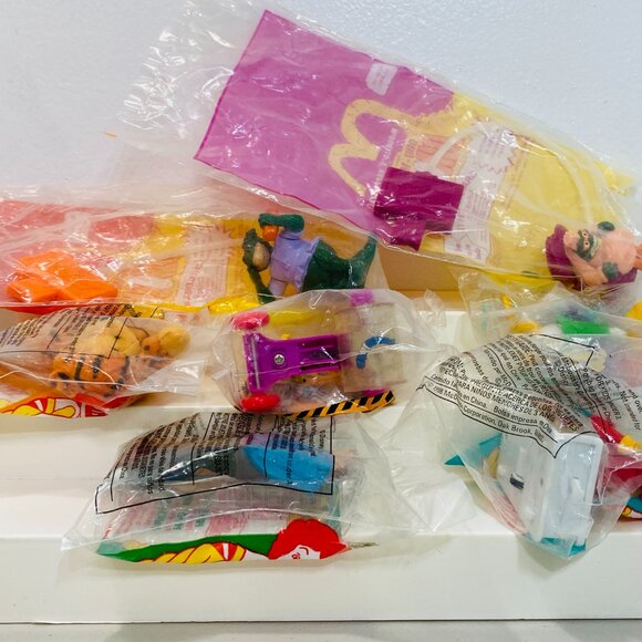 7 VNTG MCDONALDS TOYS TinyToon/Tigger/Pooh/Mickey/Dinosaurs/Phillip, Sealed Pkgs - Picture 3 of 3